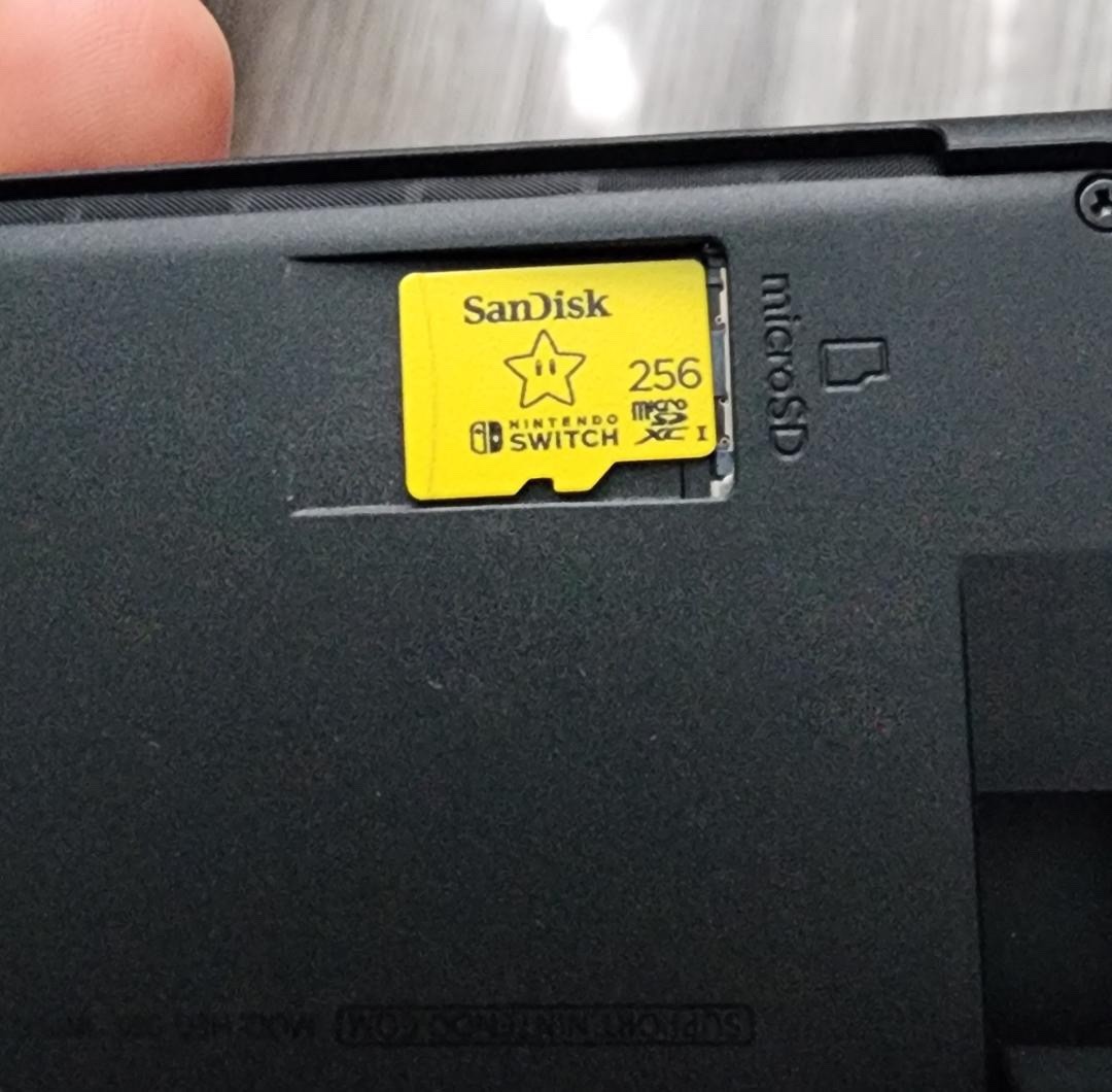 Nintendo Switch OLED Handheld Console with 256 GB SD Card