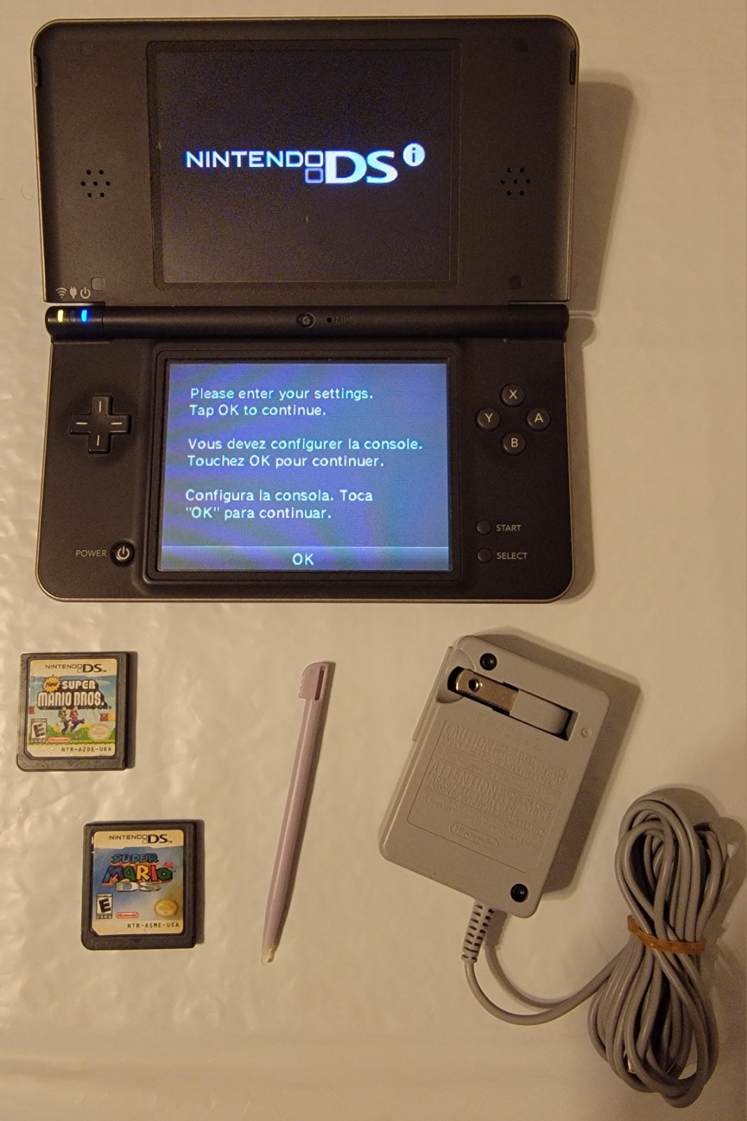 Nintendo DSi XL Bronze w/ Charger & 2 Games Mario 64 DS & New Super Mario Bros