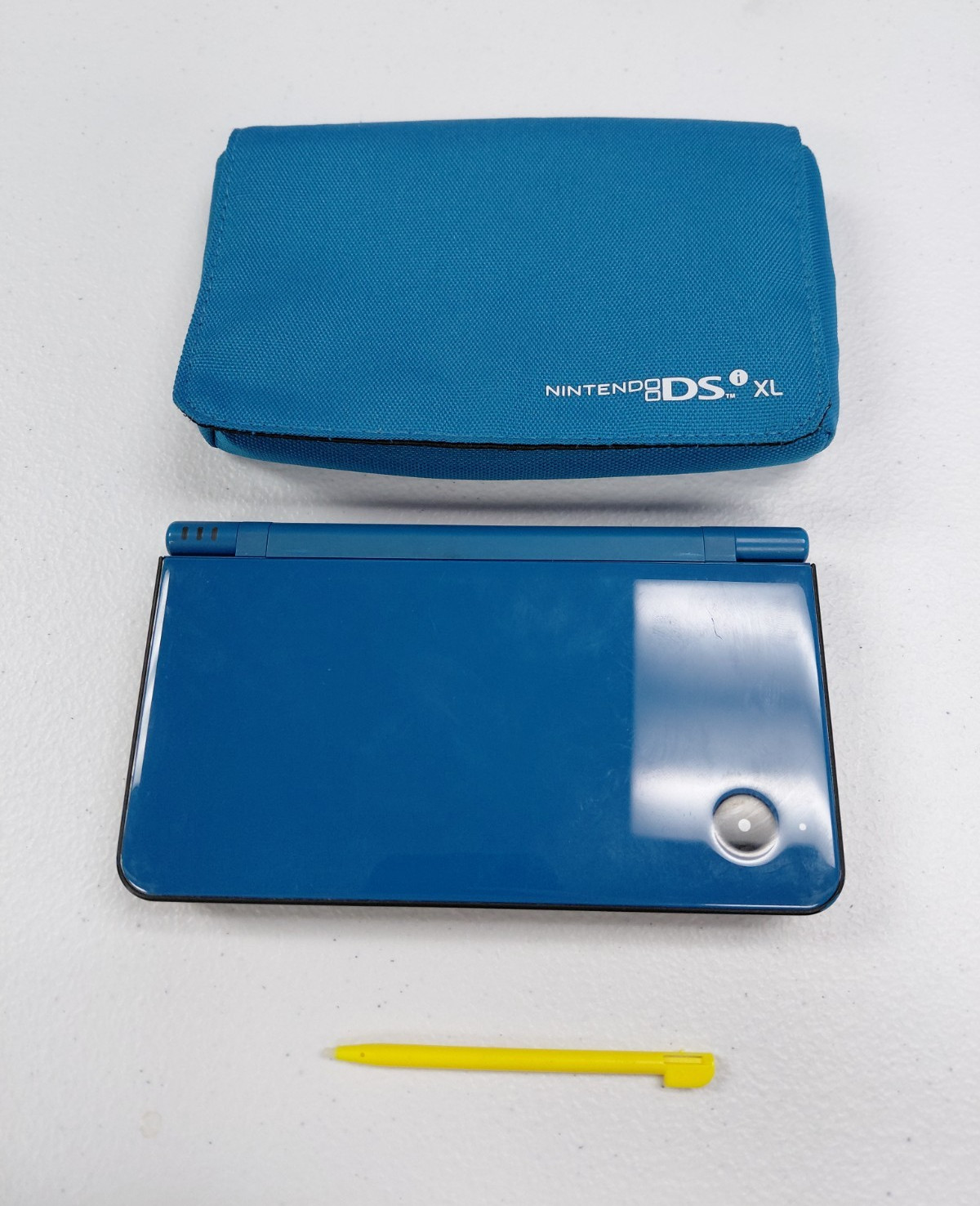 Nintendo DSi XL Blue Handheld System w/ Carrying Case & Yellow Stylus