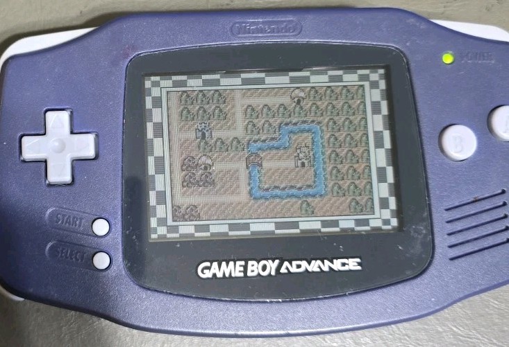 Nintendo Game Boy Advance AGB-001 Indigo Console With Mario 3, NYKO Light & Case