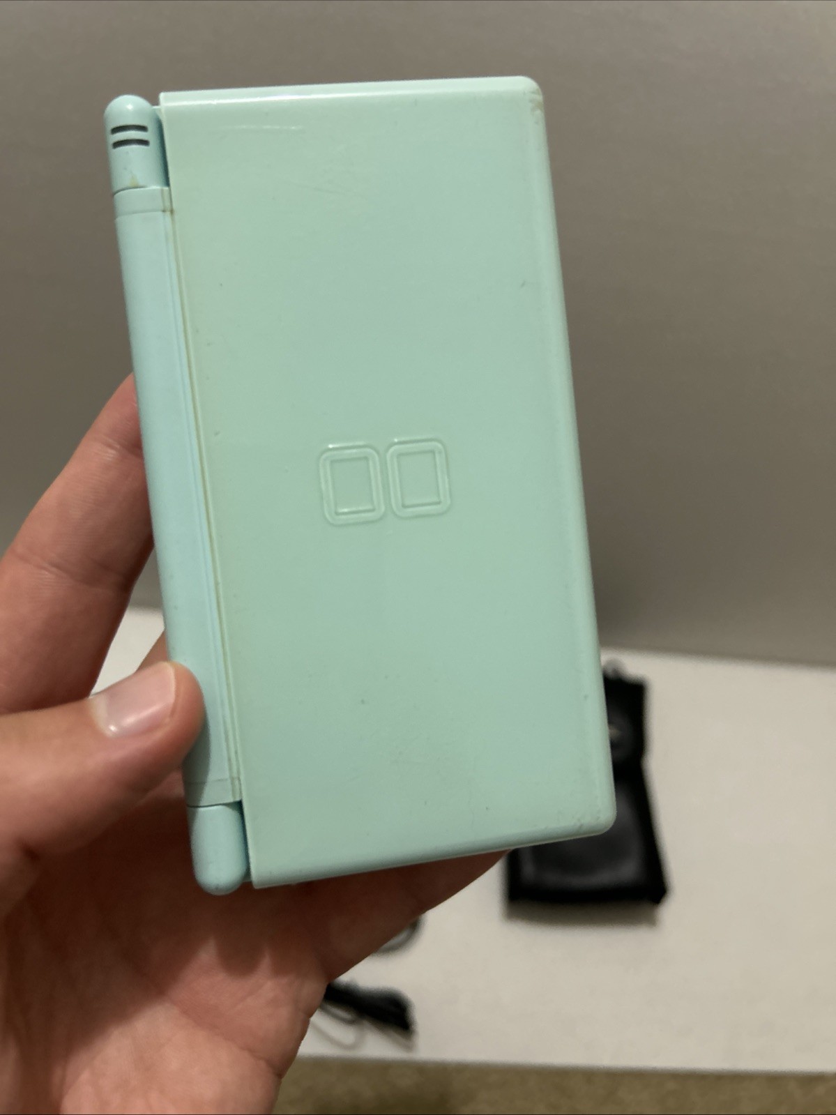 Nintendo DS Lite Light Blue Console Bundle with Game Charger And Case Read